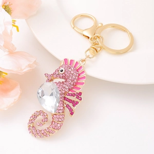 Sparkling pink rhinestone seahorse keychain with teardrop gem and gold lobster clasp