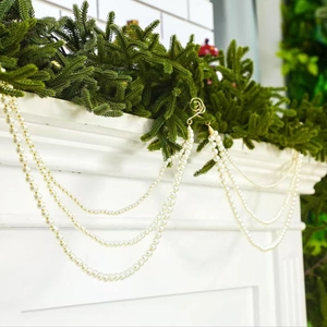 Elegant triple-layered white pearl bead garland with golden spiral hooks for Christmas decor