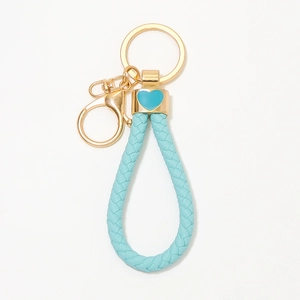 Porte-clés tressé en cuir bleu clair avec mousqueton doré et breloque en cœur