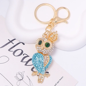 Charming gold-tone owl keychain with colorful crystal rhinestones and crown detail