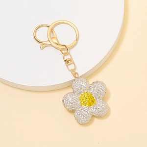 Porte-clés fleur en cristal étincelant avec anneau doré et strass blancs brillants