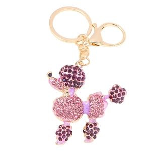 Sparkly rhinestone poodle dog keychain with purple and pink crystals on gold metal