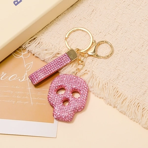 Porte-Clés Tête de Mort en Strass pour Femmes Alliage Métallique Plaqué Or Squelette Pendentif Sac Anneau de Clé Voiture Cadeau Halloween Bijoux