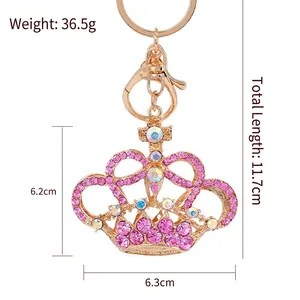 Golden crown keychain with pink rhinestones, total length 11.7cm and weight 36.5g