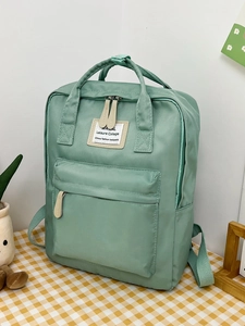 Mint green high-capacity college student backpack with a minimalist sweet aesthetic
