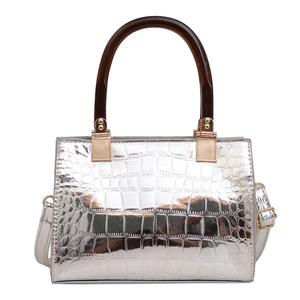 Chic silver crocodile embossed tote bag with vintage wood-style top handles and shiny finish