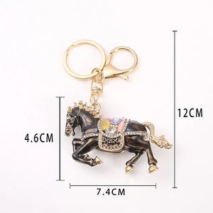Golden horse keychain with black enamel and colorful rhinestones plus size dimensions