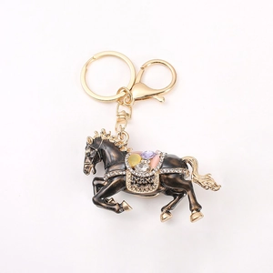 Exquisite horse keychain with brown coating and colorful crystals on golden hardware