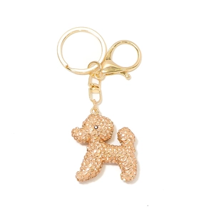 Porte-clés caniche en métal scintillant avec strass champagne et fermoir homard doré