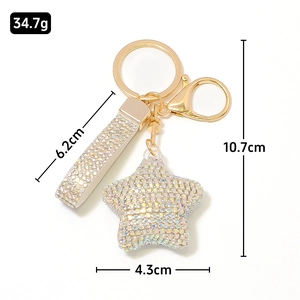 Sparkling crystal star keychain with rhinestone leather strap and gold metal clasp