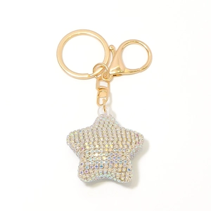 Star-shaped keychain with colorful rhinestones and gold metal lobster clasp on white background