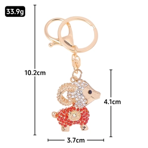 Détails du porte-clés mouton avec strass brillants et dimensions de 10,2 cm