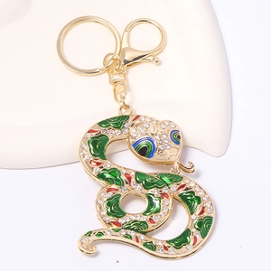 Porte-clés serpent doré avec écailles en émail et cristaux étincelants