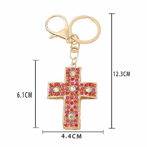 Hollow cross keychain in gold metal with colorful rhinestones and dimensions shown
