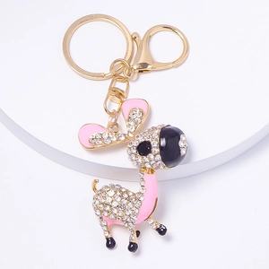 Détail du porte-clés âne doré avec strass brillants et finitions en émail rose