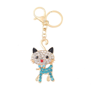 Golden cat keychain with sky blue rhinestones and bowknot detail on white background