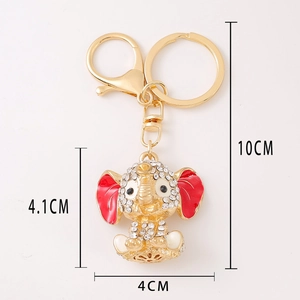 Golden elephant keychain with sparkling rhinestones and red enamel ears for bag decoration