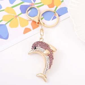 Creative dolphin keychain with pink and iridescent rhinestones in gold alloy finish