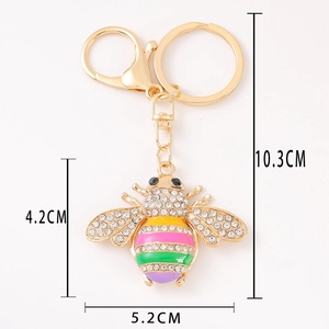 Detailed size view of the crystal bee keychain pendant with rainbow enamel colors
