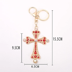 Gold cross keychain with red rhinestones and pearls, luxury religious car accessory
