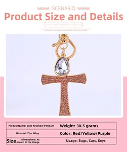Detailed close-up of crystal cross keychain with pink rhinestones and zinc alloy frame