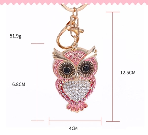 Detailed view of owl keychain with pink rhinestones showing 12.5cm total length