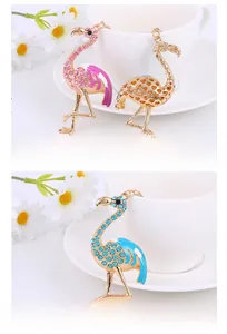 Detail of pink and blue enamel flamingo keychain with colorful rhinestone accents