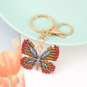 Sparkling crystal butterfly keychain with colorful rhinestones on a golden ring