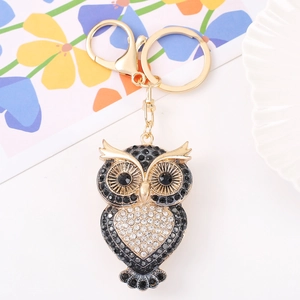 Creative golden metal owl keychain with sparkling black and white rhinestones decoration