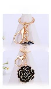 Detail of rose keychain featuring high-quality spring clasp and sparkling crystal accents