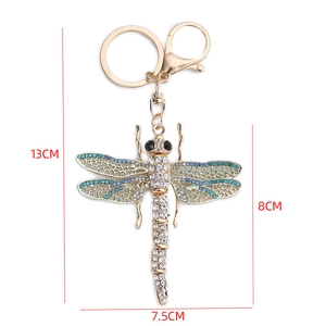 Detailed size view of sparkling dragonfly keychain with blue rhinestones and dimensions