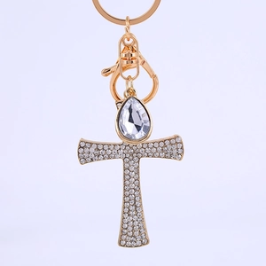 Gold Ankh cross keychain with white rhinestones and large pear-cut crystal centerpiece