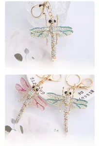 Detail of dragonfly keychain with colorful rhinestones and gold-plated alloy finish