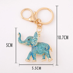 Blue rhinestone elephant keychain with gold metal plating and dimensions labels