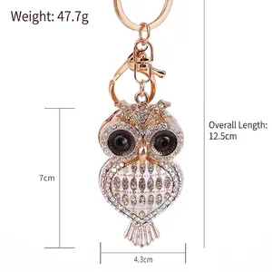 Porte-clés chouette de luxe avec strass brillants et métal doré, longueur totale de 12,5 cm