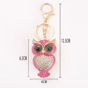 Pink rhinestone owl keychain with gold metal frame showing detailed size measurements