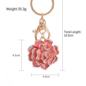 Pink rose flower keychain with rhinestones, 10.5cm length and lobster clasp detail