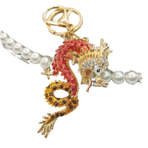 Golden alloy Chinese dragon keychain with sparkling red and white crystals ornament