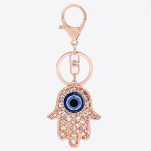 Hamsa Hand Schlüsselanhänger in Roségold mit Evil Eye und funkelnden Kristallen