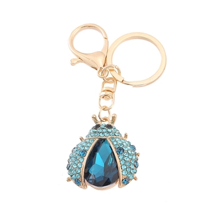 Blue rhinestone ladybug keychain with gold alloy base and sparkling insect pendant