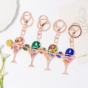Set of four crystal cocktail glass keychains with colorful rhinestones in rose gold finish
