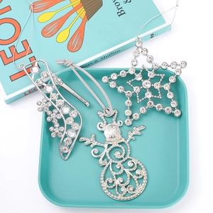 Three-piece silver rhinestone Christmas ornaments featuring high heels, snowman, and star shapes