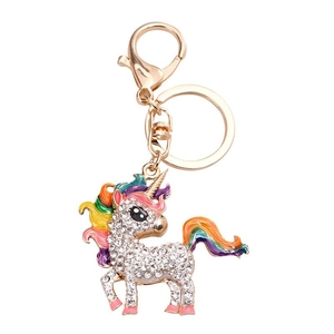 Sparkling unicorn keychain with colorful enamel and crystals on a golden metal ring