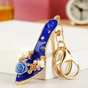 Blue rose high heel keychain with gold-plated alloy frame and sparkling crystal accents
