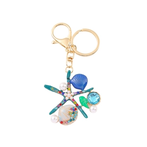 Porte-clés étoile de mer et coquillage coloré avec perles et strass sur chaîne dorée