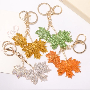 Porte-clés feuille d'érable en cristal étincelant avec strass et fermoir homard