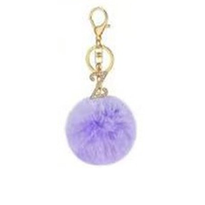 Detailed close-up of a purple faux fur keychain with a gold rhinestone-encrusted letter Z
