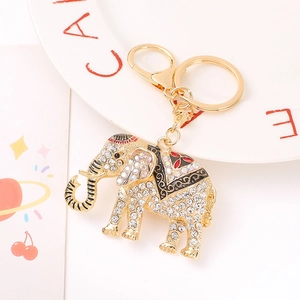 Sparkling crystal elephant keychain with gold alloy finish and enamel details for handbags