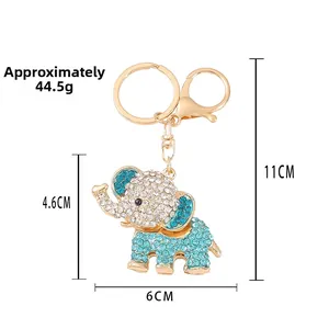 Crystal elephant keychain with blue and white rhinestones and gold metal base dimensions
