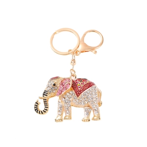 Close-up of sparkling elephant keychain with pink enamel ears and rhinestone details